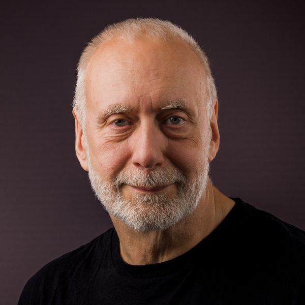Image of a white male with short grey hair and a beard.